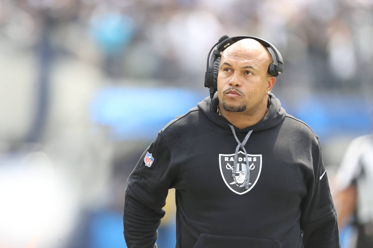 Raiders head coach Antonio Pierce looks to the stands during the second half of an NFL game at ...