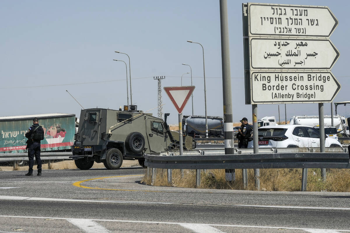 Israeli police stand guard near the site of a deadly shooting attack where Israeli officials sa ...