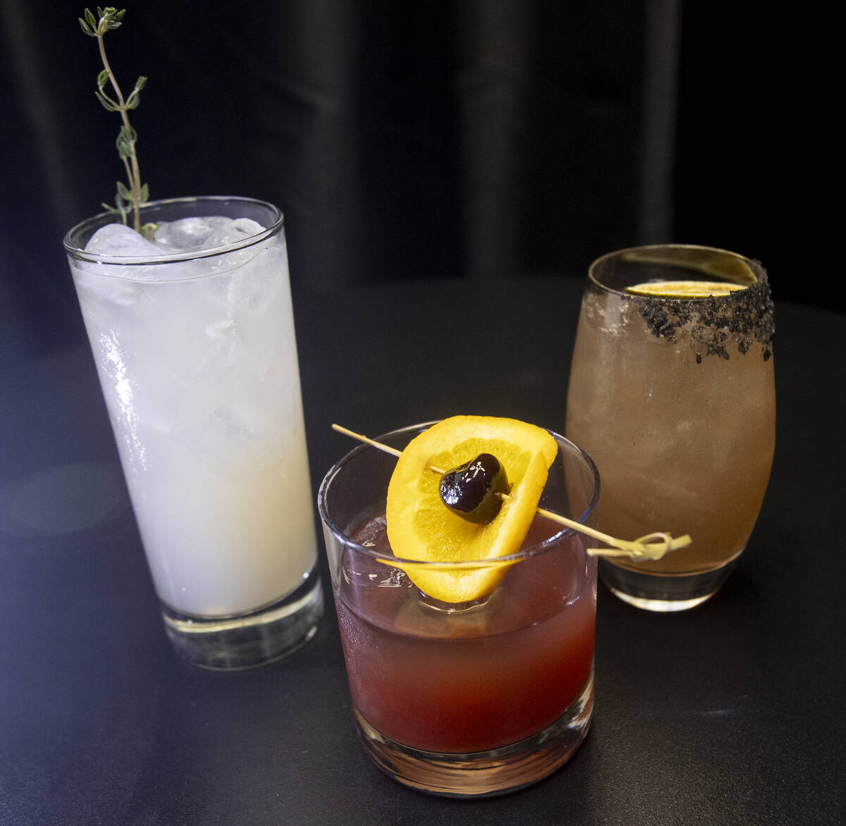 From left: a Belvedere Spiced Pear cocktail, a Hennessy Tart Cherry Sour and a Volcan de Mi Tie ...