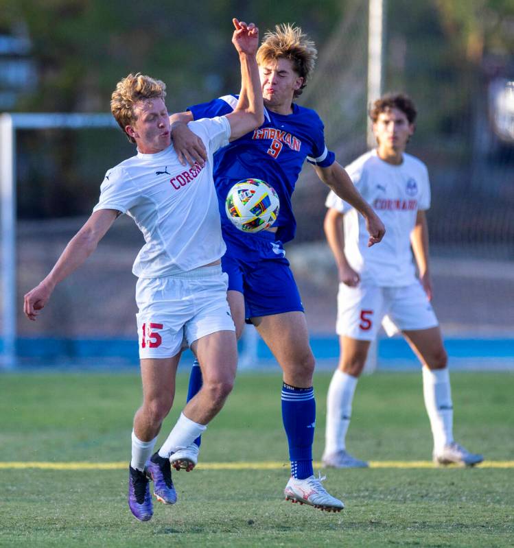 Bishop Gorman forward Chase Stewart (9) battles for the ball with Coronado defender Ben Aronow ...