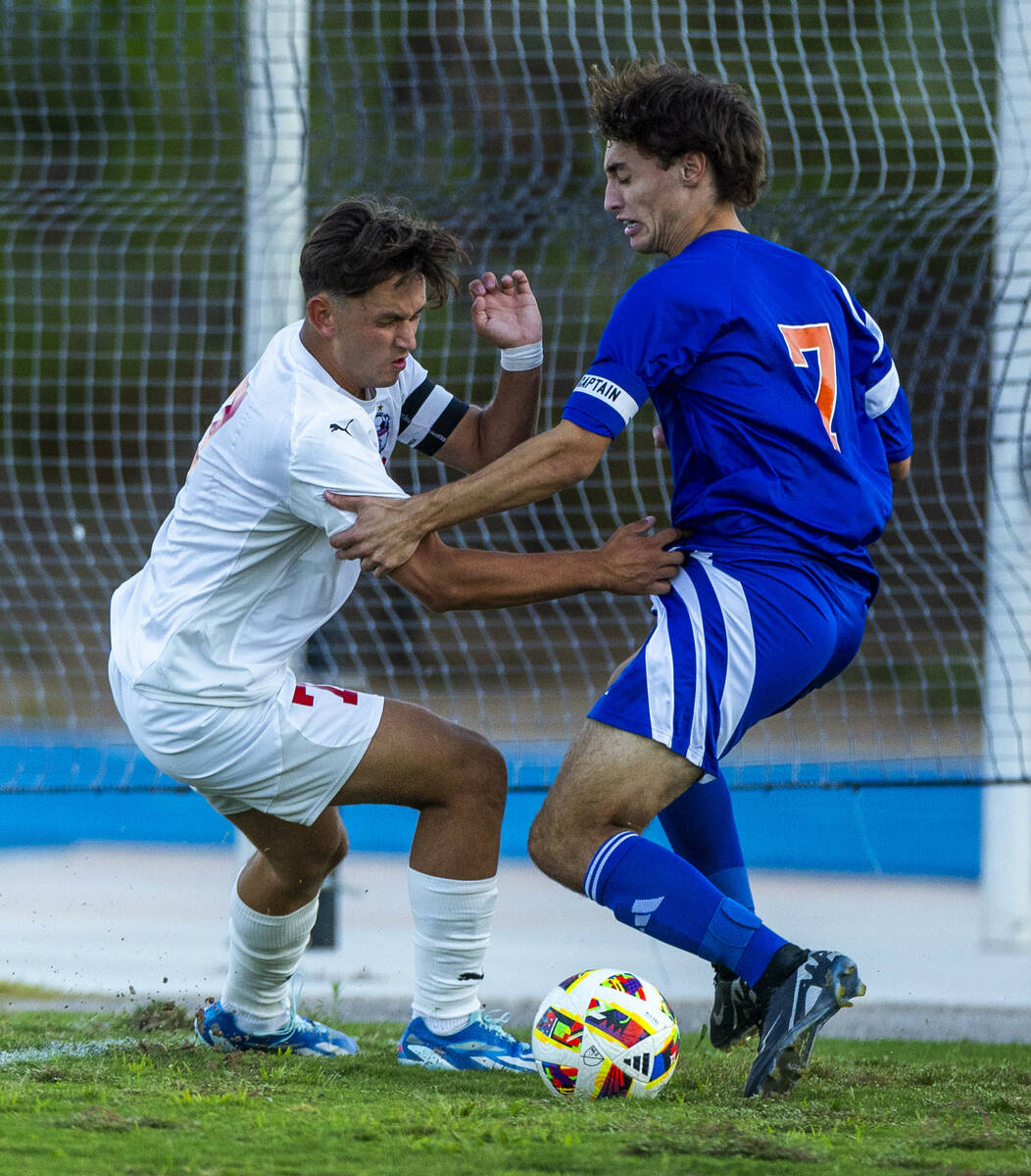 Coronado forward Austin Kiernan (7) battles for control with Bishop Gorman midfielder Maddix Bo ...