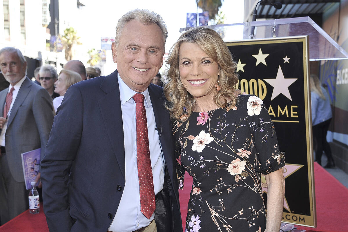 Pat Sajak, left, and Vanna White, from "Wheel of Fortune," attend a ceremony honoring Harry Fri ...