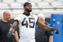 Jacksonville Jaguars K'Lavon Chaisson (45) warms up before an NFL football practice, Tuesday, M ...