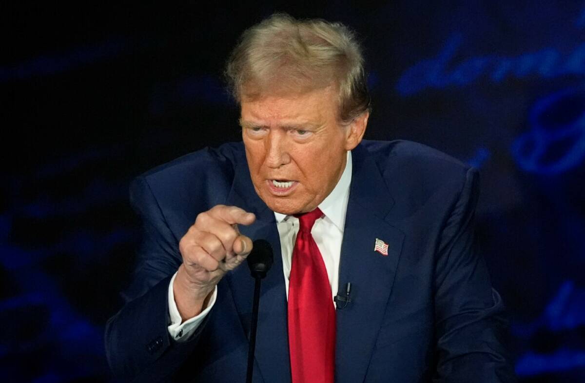 Former President Donald Trump speaks during a presidential debate with Democratic presidential ...