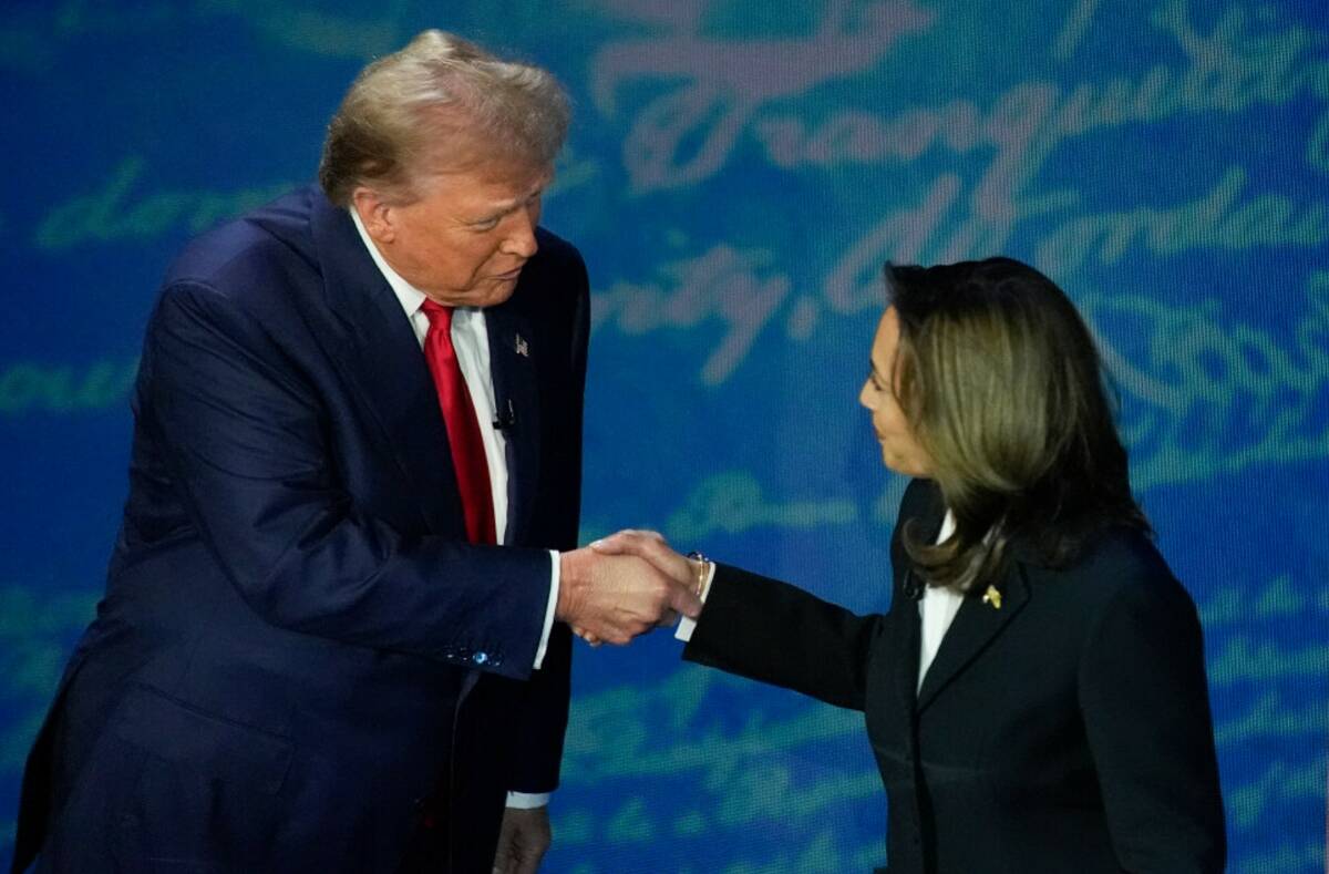 Former President Donald Trump shakes hands with Vice President Kamala Harris during an ABC News ...