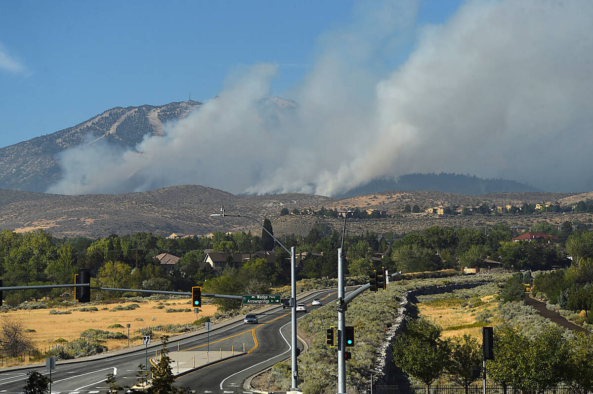 The Davis Fire continues to burn in the mountains south of Reno, Nevada, Tuesday, September 10, ...