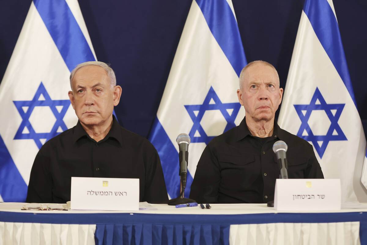 FILE -Israeli Prime Minister Benjamin Netanyahu, left and Defense Minister Yoav Gallant attend ...