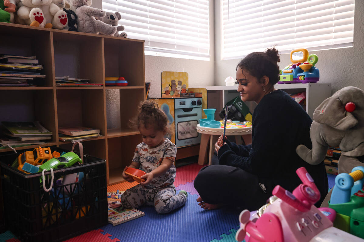 Katherine Sheffey plays with her son Kyo Sheffey, 2, at one of the properties owned by the nonp ...