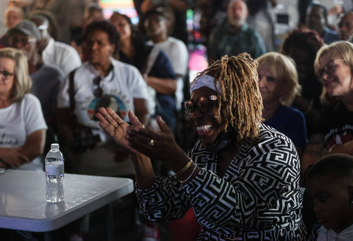 Tia Watson reacts during a watch party of the presidential debate between Kamala Harris and Don ...