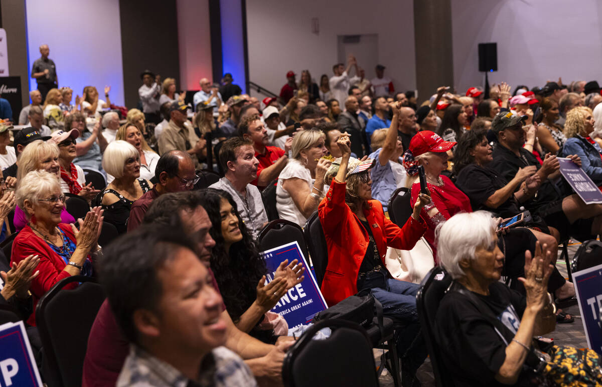 Supporters at a watch party cheer for Republican presidential nominee former President Donald T ...