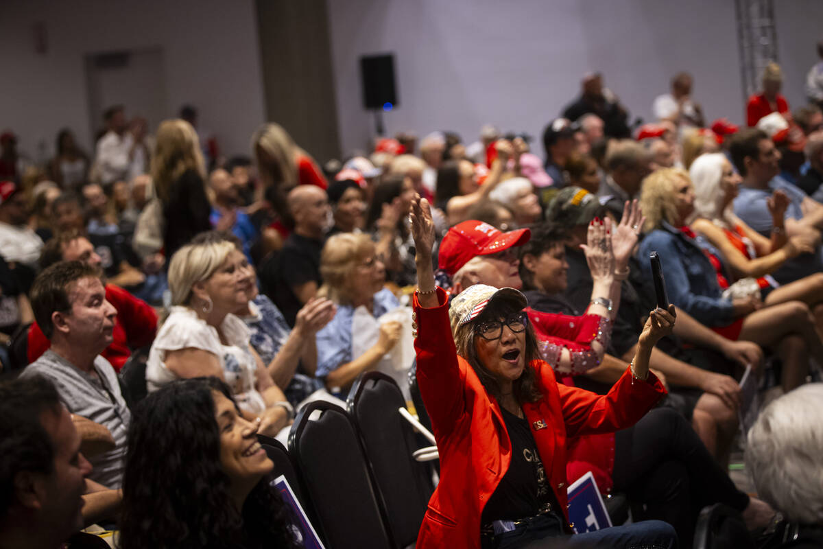 Dolly De Leon of Las Vegas cheers for Republican presidential nominee former President Donald T ...