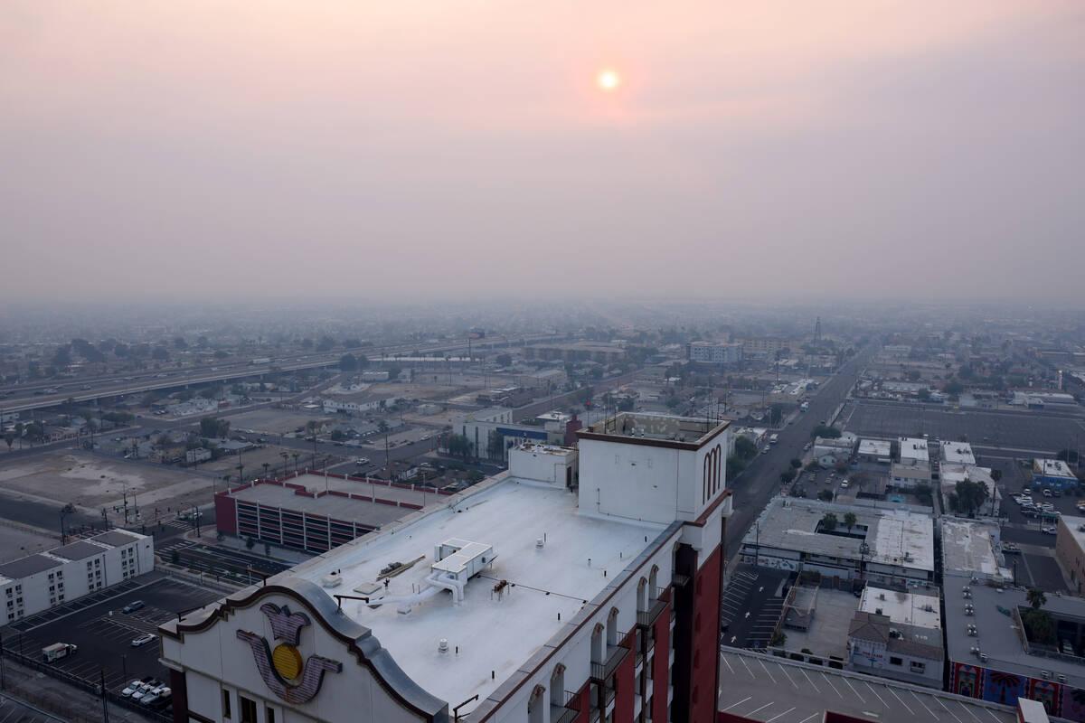 Smoke from wildfires burning in Southern California is seen in the skies above downtown Las Veg ...