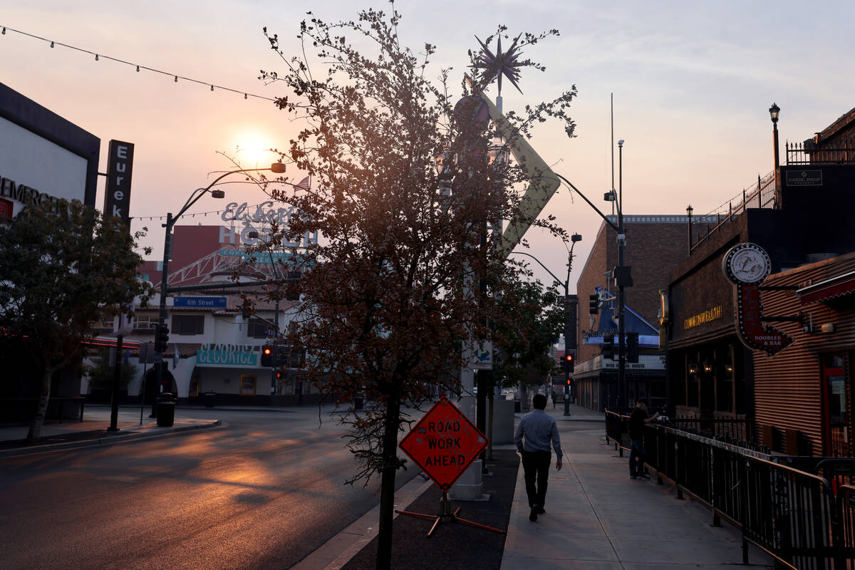 Smoke from wildfires burning in Southern California is seen in the skies above downtown Las Veg ...