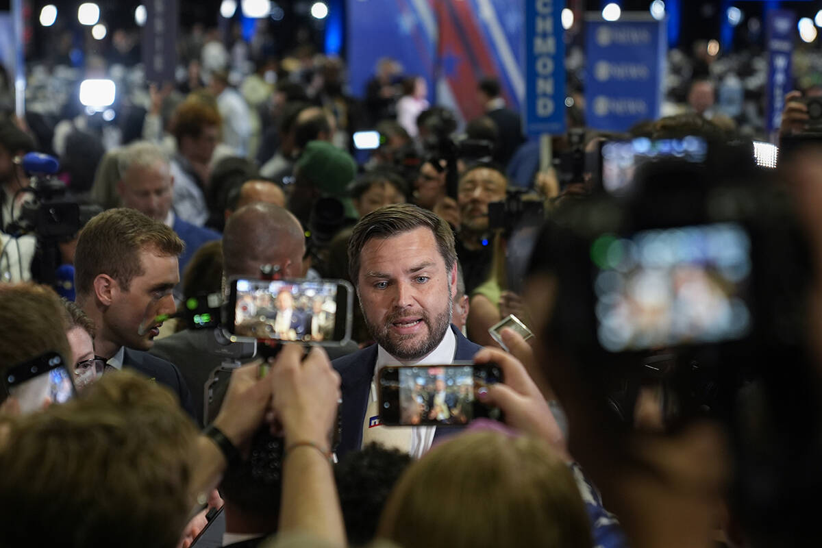 Republican vice presidential nominee Sen. JD Vance, R-Ohio, speaks to reporters in the spin roo ...