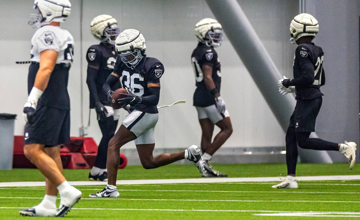 Raiders cornerback Kyu Blu Kelly (36) grabs a pass during practice at the Intermountain Health ...