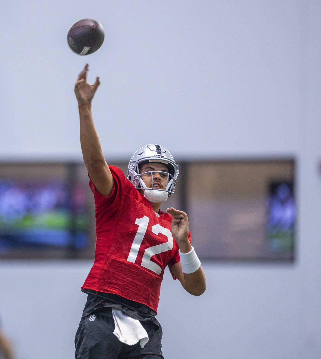 Raiders quarterback Aidan O'Connell (12) throws a pass during practice at the Intermountain Hea ...