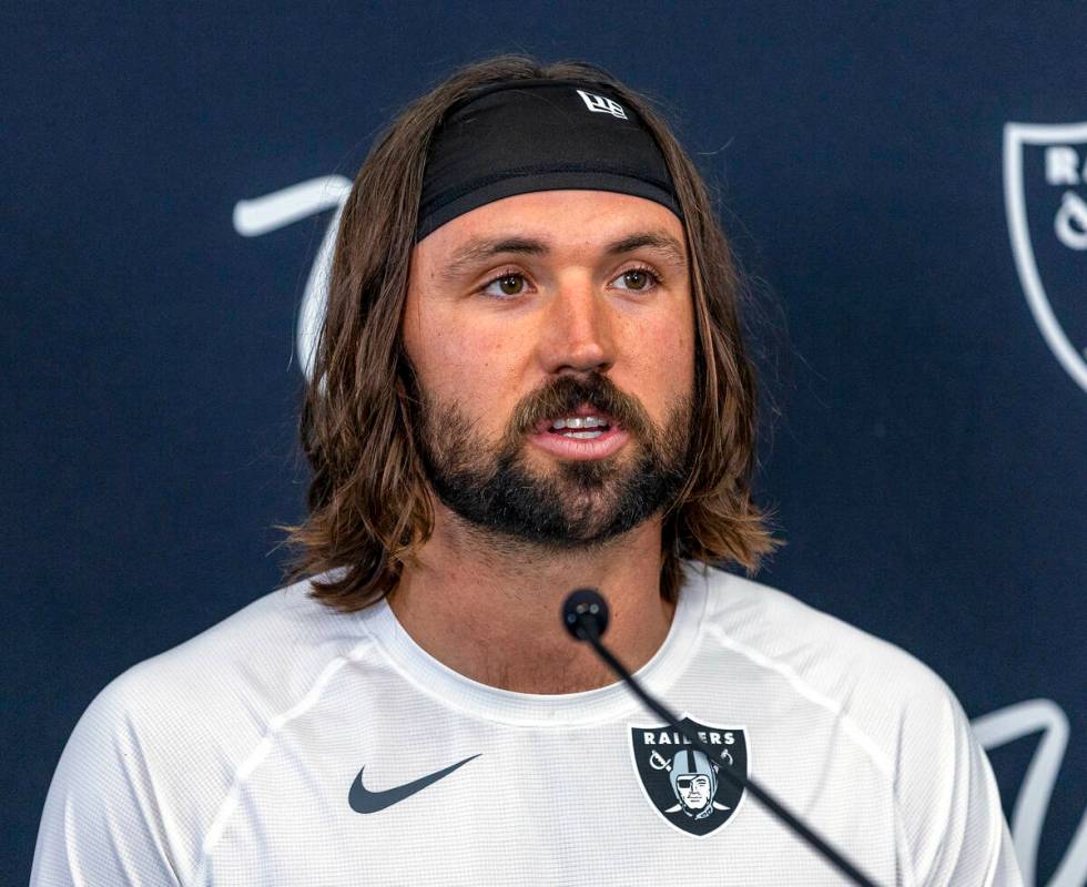 Raiders quarterback Gardner Minshew (15) answers a question during a media interview at the Int ...