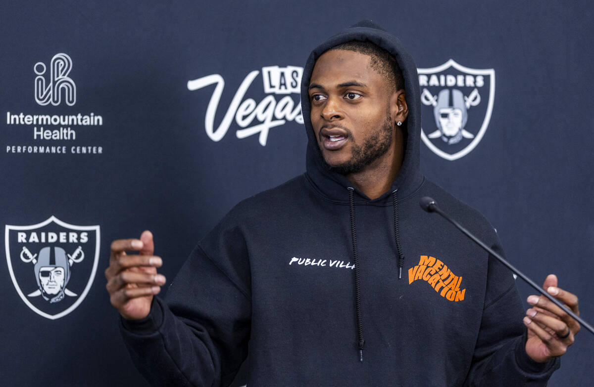 Raiders wide receiver Davante Adams (17) answers to a question during a media interview at the ...