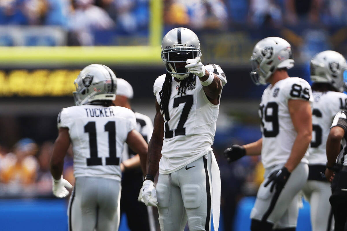 Raiders wide receiver Davante Adams (17) points after a reception during the first half of an N ...