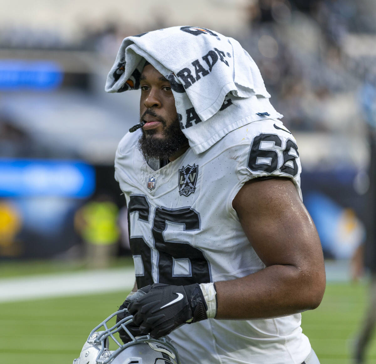 Raiders guard Dylan Parham (66) runs off the field following their NFL game at SoFi Stadium on ...