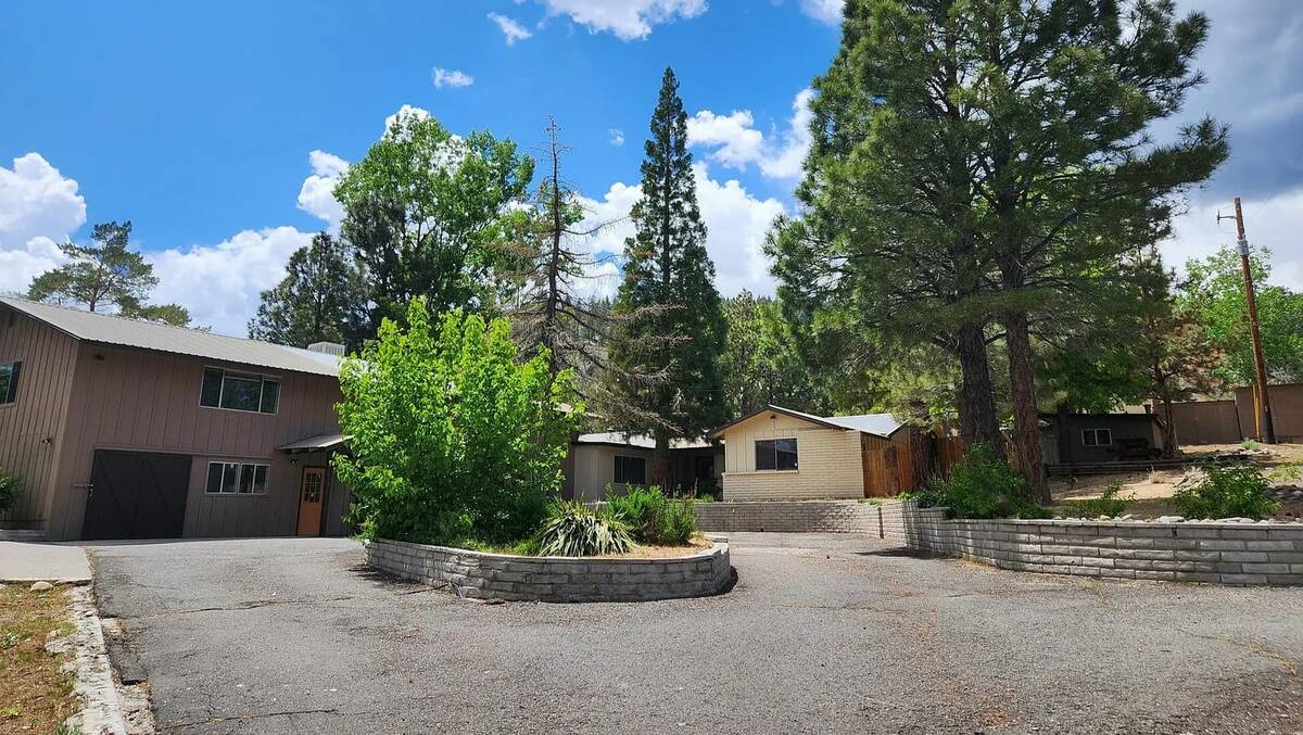 A photo shows Aaron Sims' family home in Washoe Valley before it was burned down in the Davis F ...