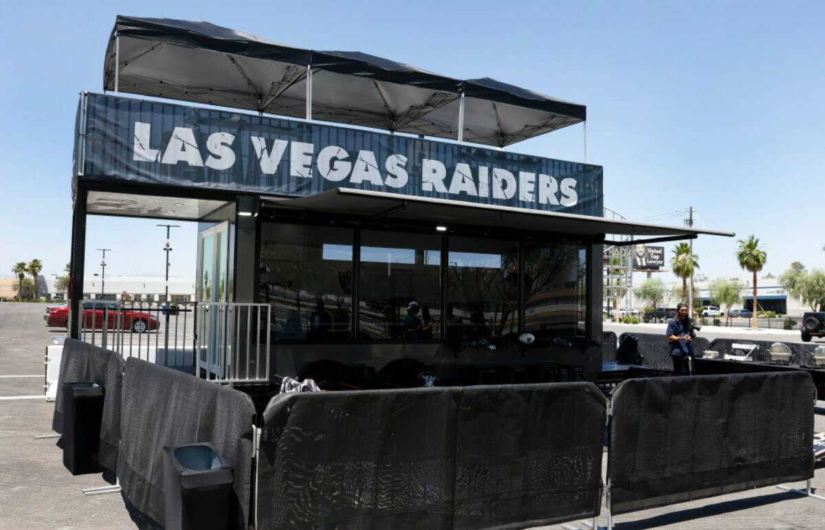 Raiders premium tailgate, stationed outside of Allegiant Stadium, is seen, on Thursday, June 20 ...