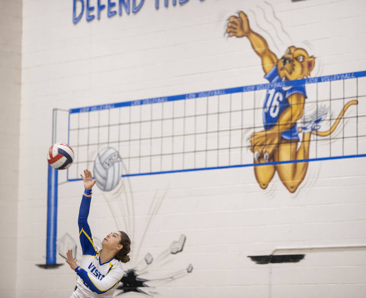 Sierra Vista senior Angelina DeGrange (23) serves the ball during the high school volleyball ga ...