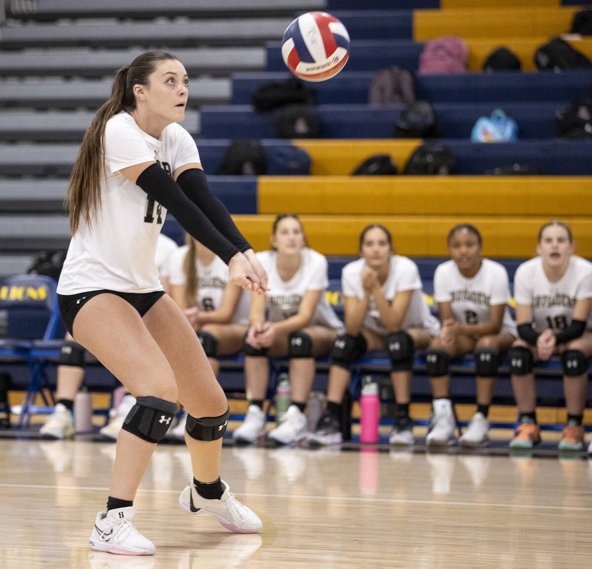 Faith Lutheran senior Sienna Lopez (14) competes during the high school volleyball game against ...