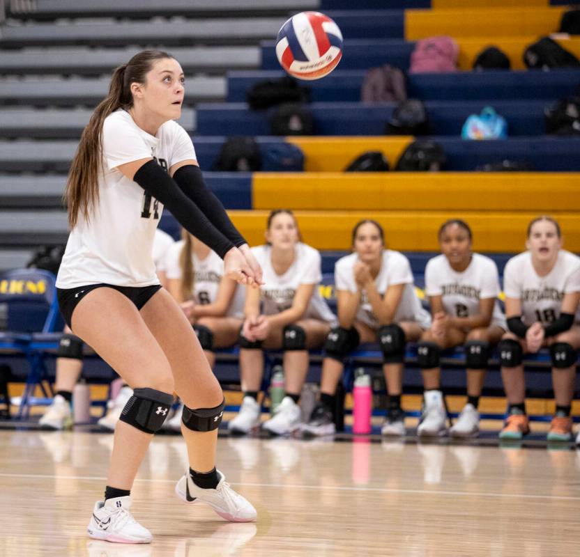 Faith Lutheran senior Sienna Lopez (14) competes during the high school volleyball game against ...