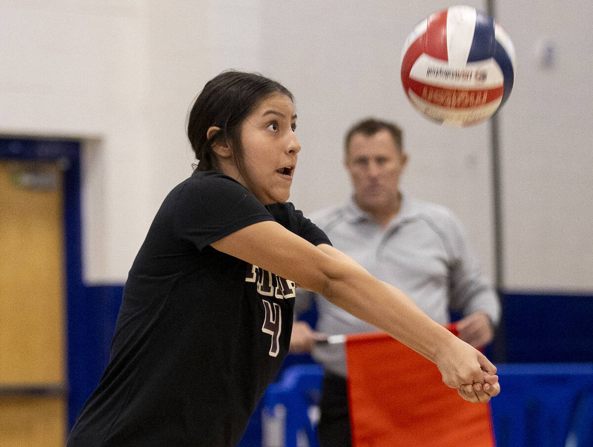 Faith Lutheran junior Leah Hernandez (4) competes during the high school volleyball game agains ...