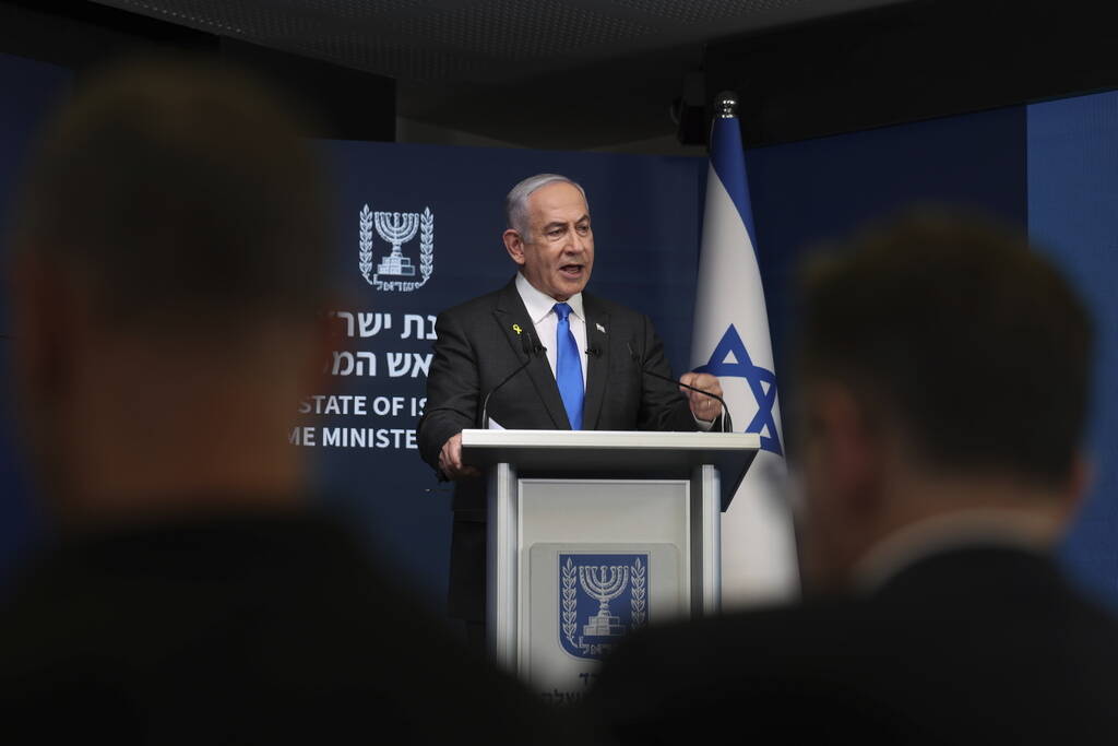 Israeli Prime Minister Benjamin Netanyahu speaks during a press conference at the Government Pr ...