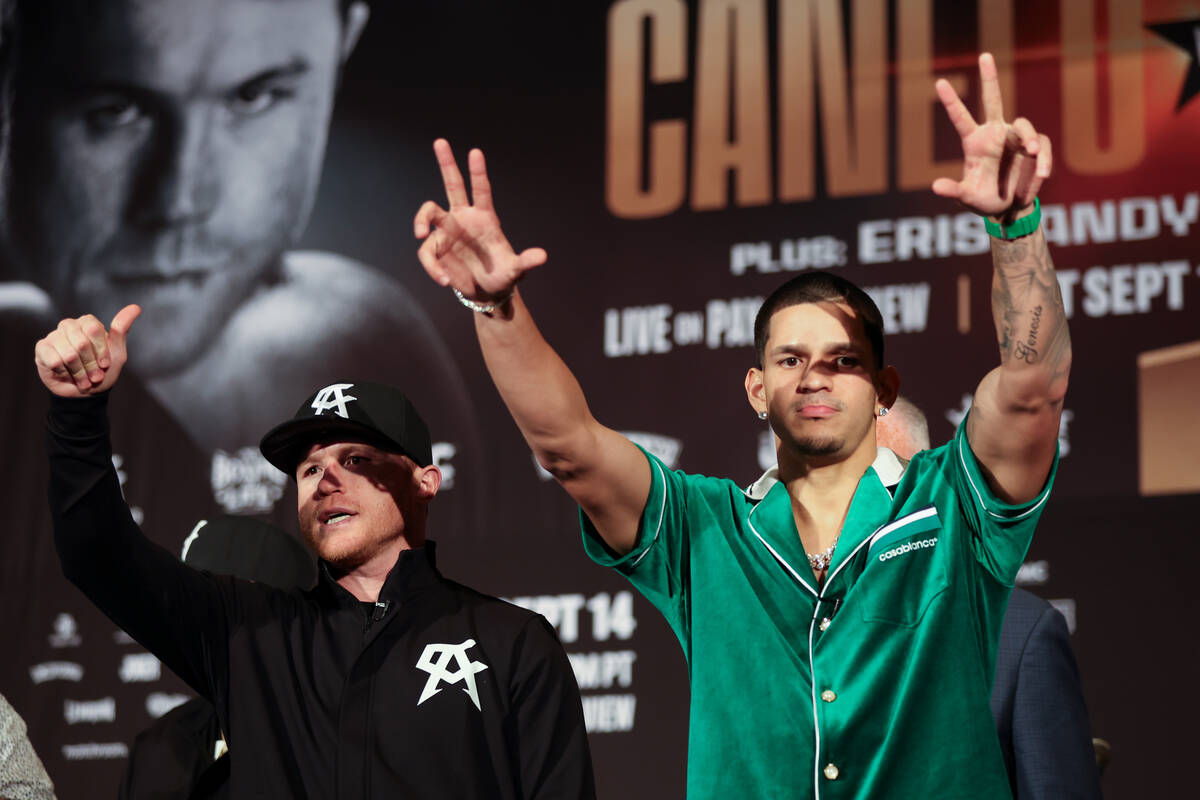 Canelo Alvarez, left, and Edgar Berlanga, pose during a press conference ahead of their super m ...