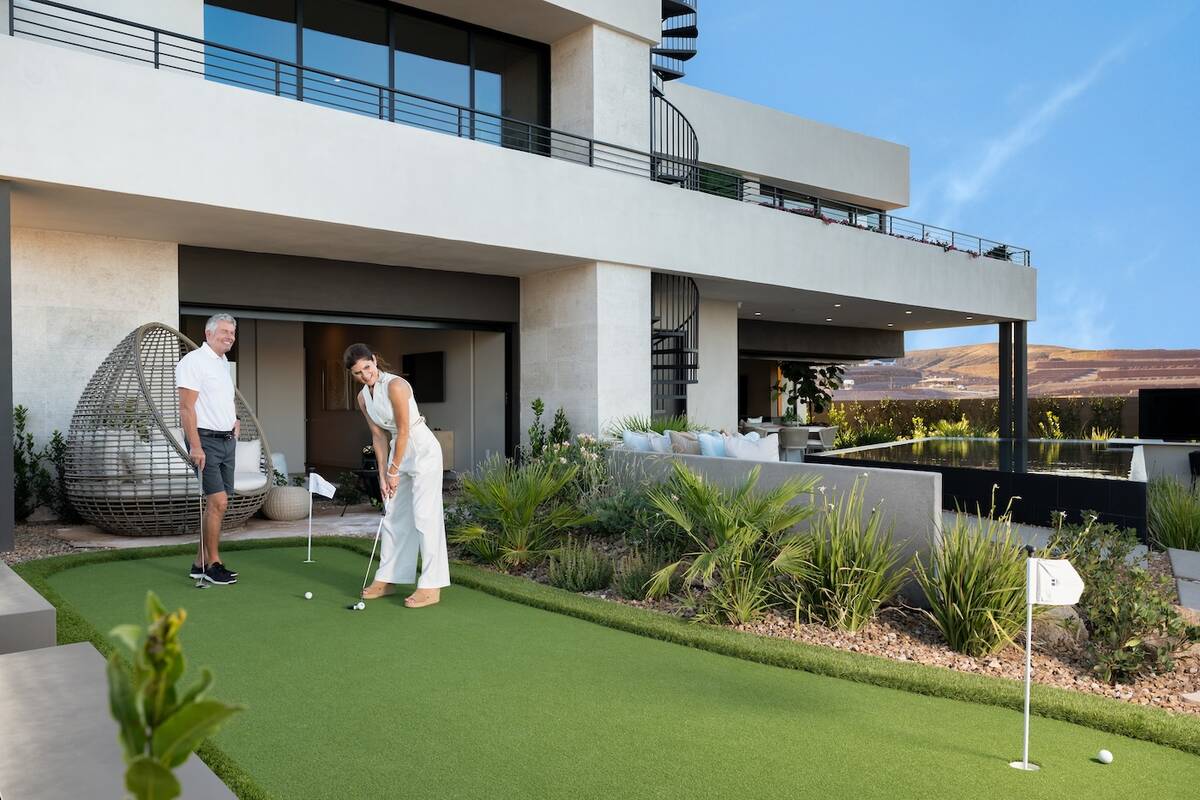 The Blue Heron Nexus show home features a putting green.