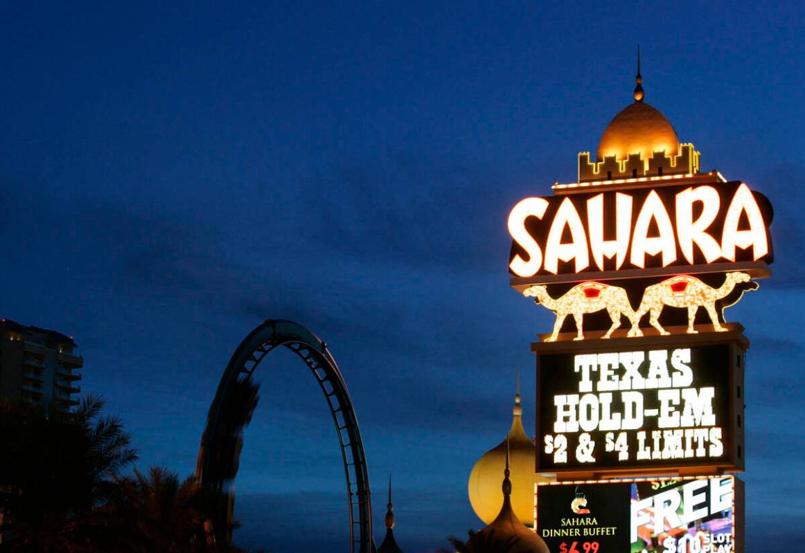 The Sahara hotel-casino sign and the resort's rollercoaster, Speed-The Ride, are shown Friday, ...