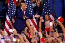 Republican presidential nominee former President Donald Trump arrives to speak at a campaign ra ...