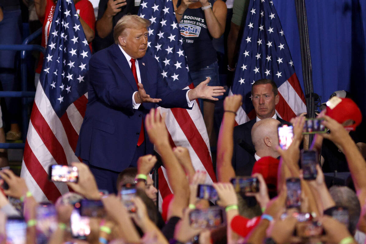 Republican presidential nominee former President Donald Trump arrives to speak at a campaign ra ...