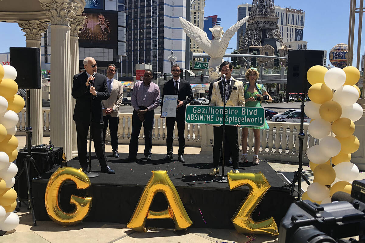 Caesars Palace President Gary Selesner, far left, is joined by hotel GM Sean McBurney and Clark ...