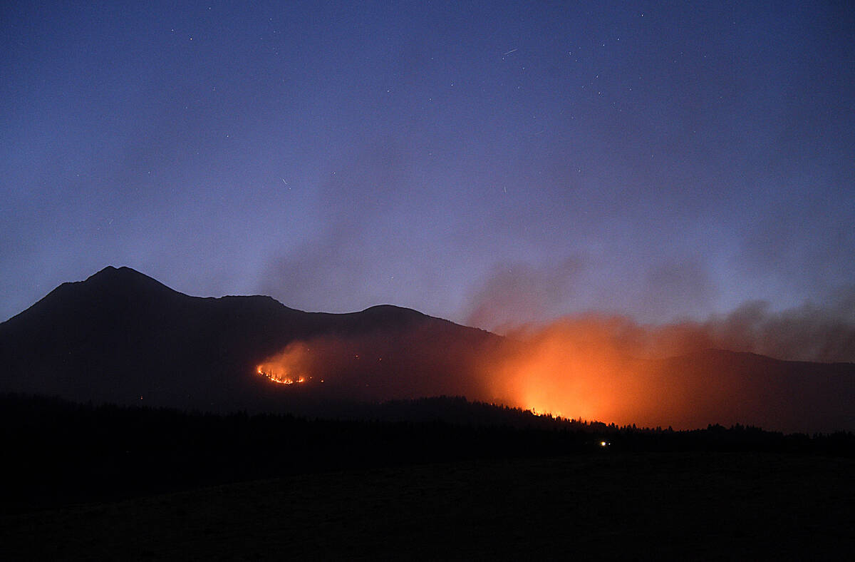 The Davis Fire burns into the night south of Reno on Wednesday, Sept. 11, 2024. (Jason Bean/Ren ...