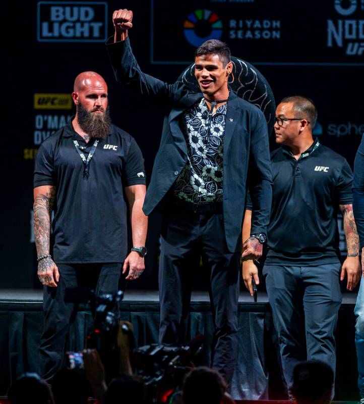 Fighter Daniel Zellhuber salutes his fans after a face off with his opponent during the UFC 306 ...