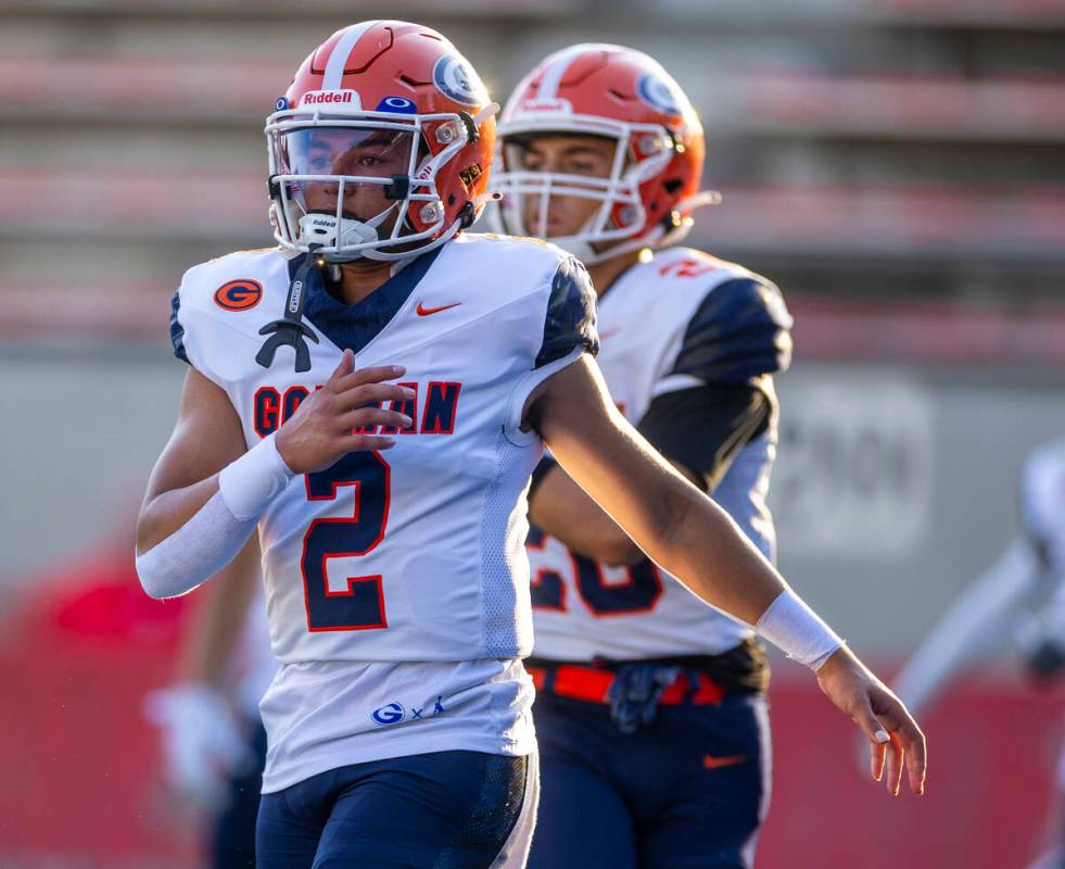 Bishop Gorman quarterback Melvin Spicer IV (2) warms up to face Mater Dei in their high school ...