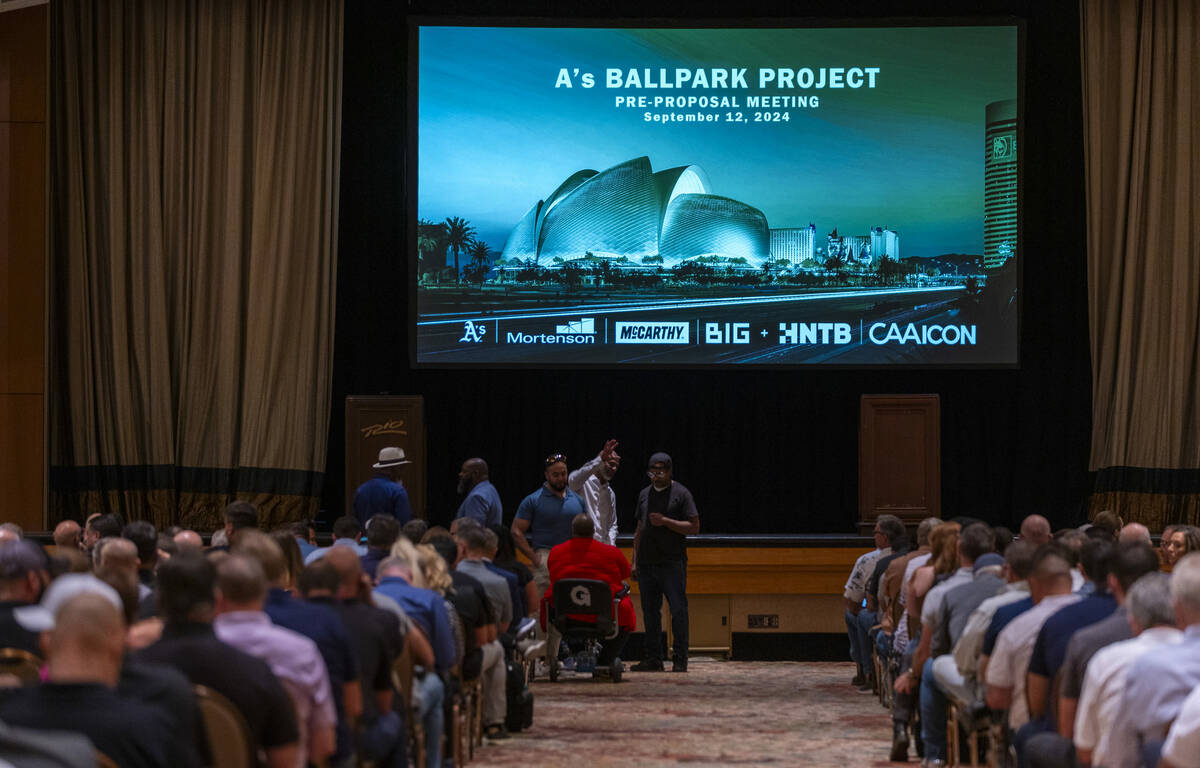 Attendees sit as Mortenson-McCarthy, the Athletic's stadium construction manager, hosts a ballp ...