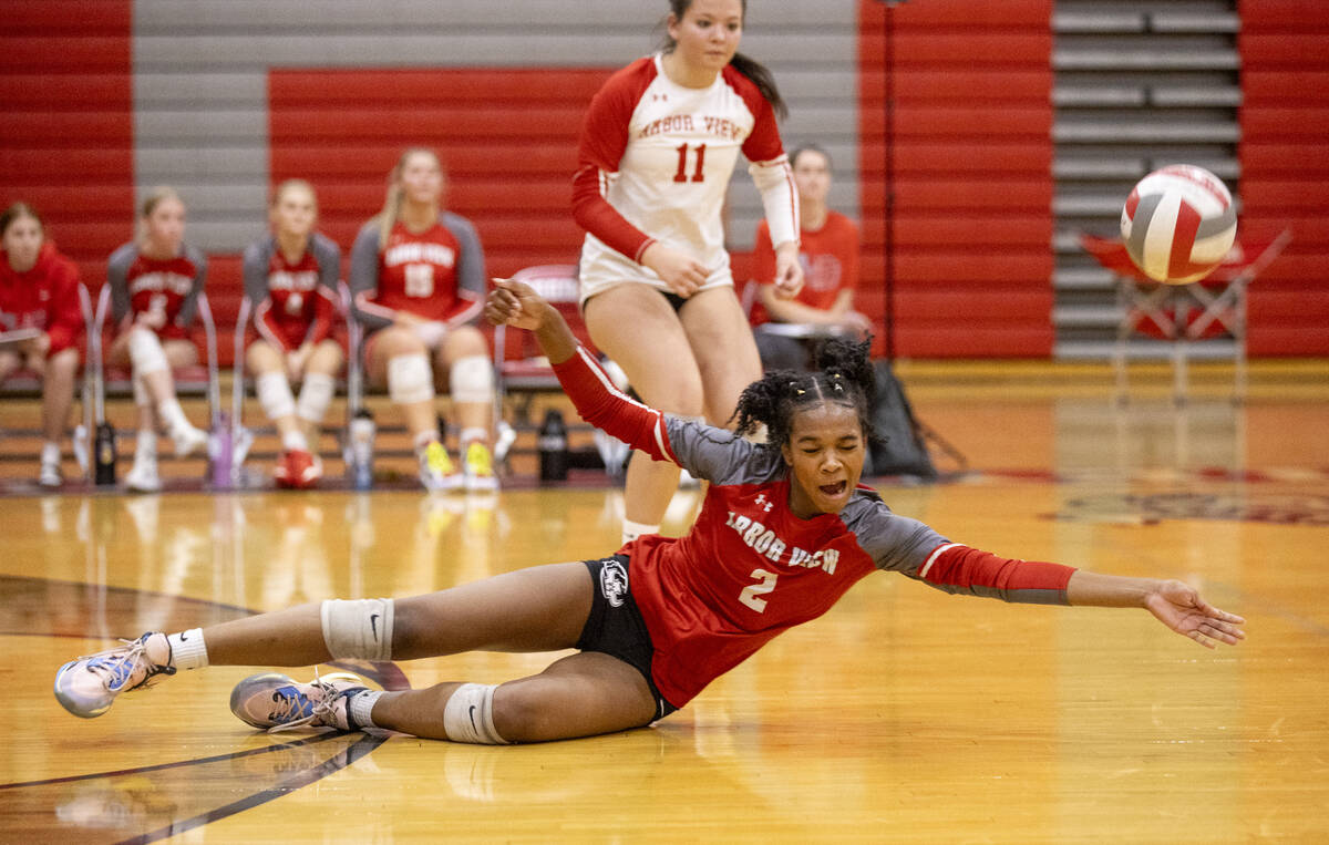 Arbor View junior Cameron Reese (2) dives for the ball during the high school volleyball game a ...