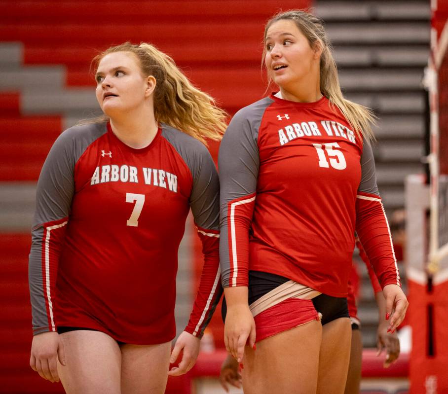 Arbor View senior Madison Garvin (7) and senior Piper Halvorson (15) wait for the serve during ...