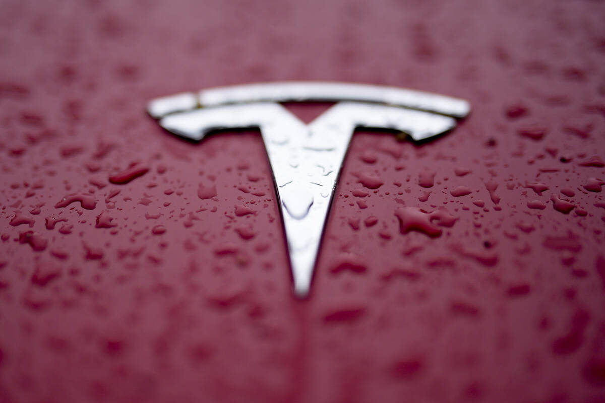 A Tesla logo is shown on Feb. 27, 2024, in Charlotte, N.C. (AP Photo/Chris Carlson, File)