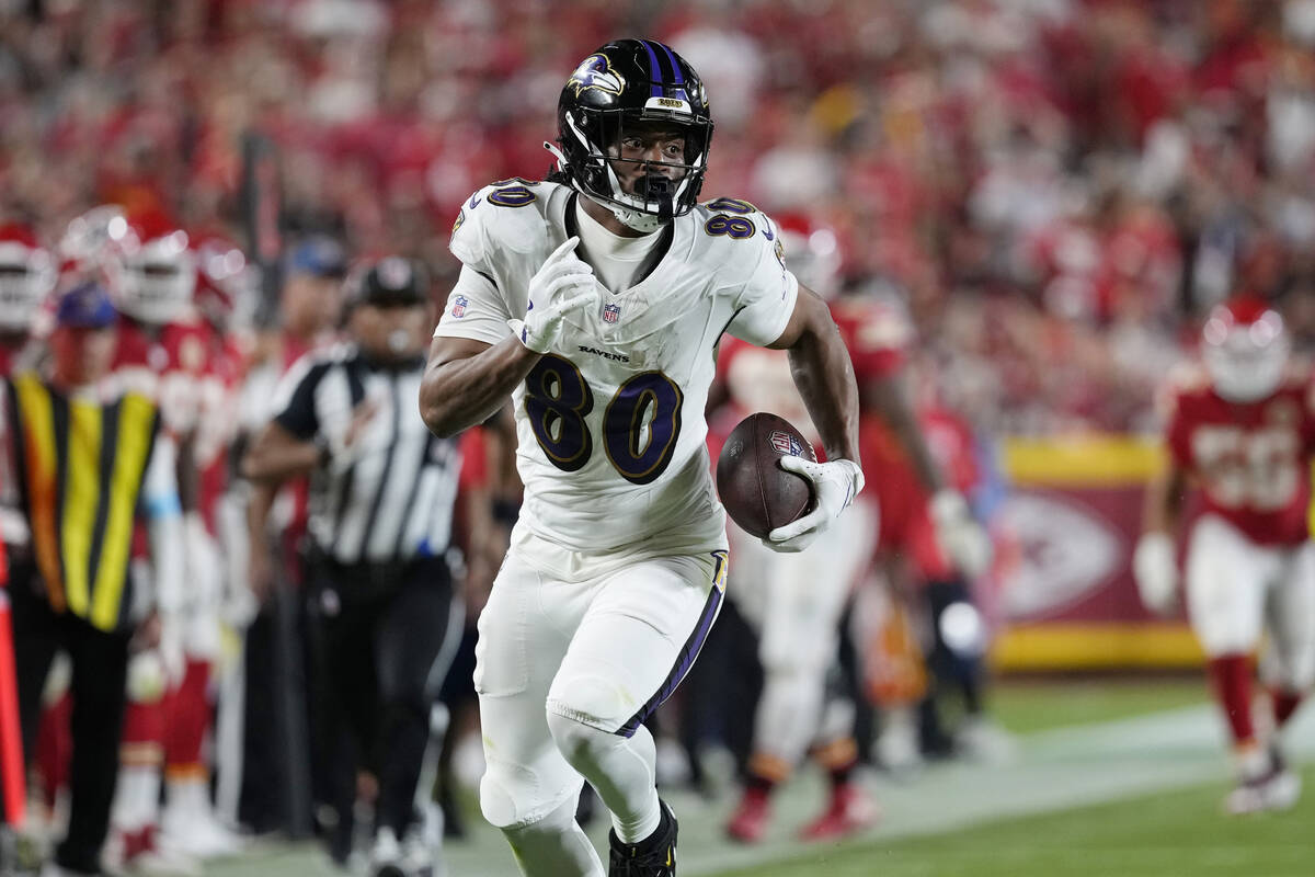 Baltimore Ravens tight end Isaiah Likely runs against the Kansas City Chiefs during an NFL foot ...