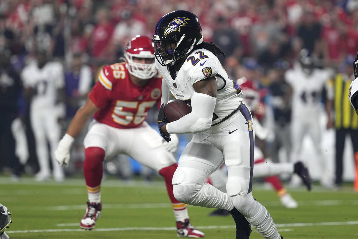 Baltimore Ravens running back Derrick Henry runs against the Kansas City Chiefs during an NFL f ...