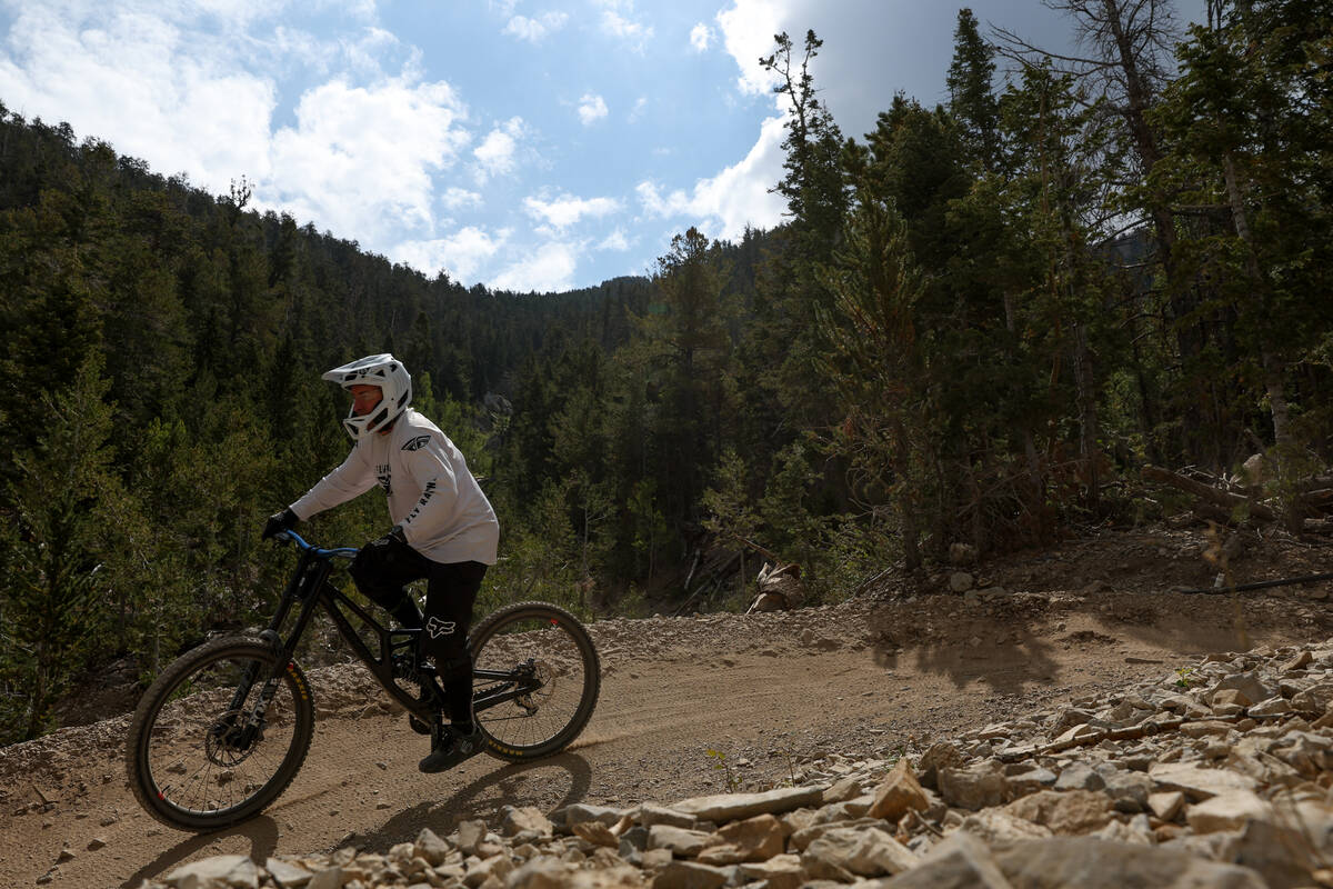 A mountain biker begins his descent of the trials at Lee Canyon on Saturday, Sept. 7, 2024, at ...