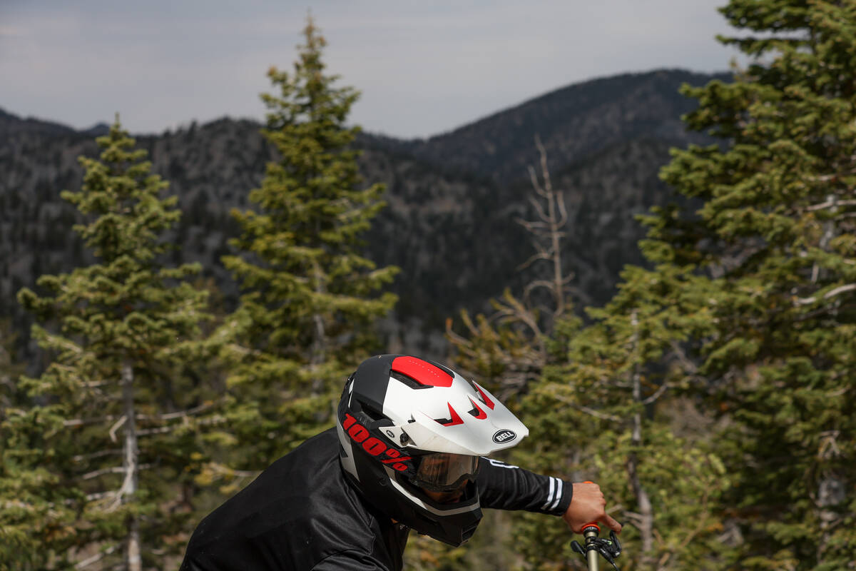 A mountain biker rounds a curve at Lee Canyon on Saturday, Sept. 7, 2024, at Mount Charleston. ...