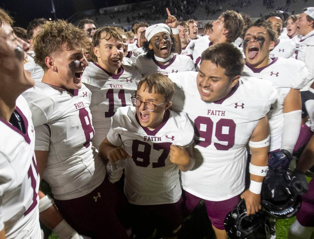 Faith Lutheran celebrates the 35-20 win over Shadow Ridge at Shadow Ridge High School, Friday, ...