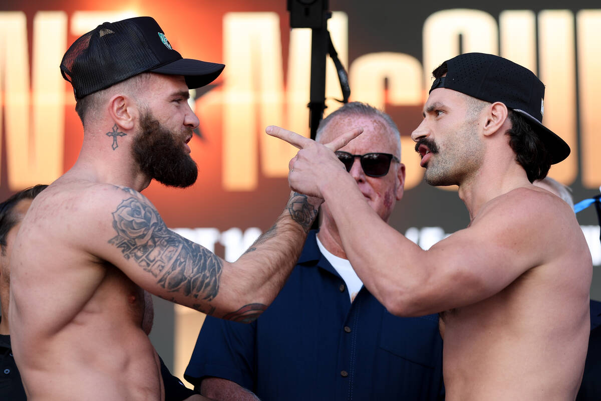 Caleb Plant, left, and Trevor McCumby face off during weigh ins ahead of their interim WBA supe ...